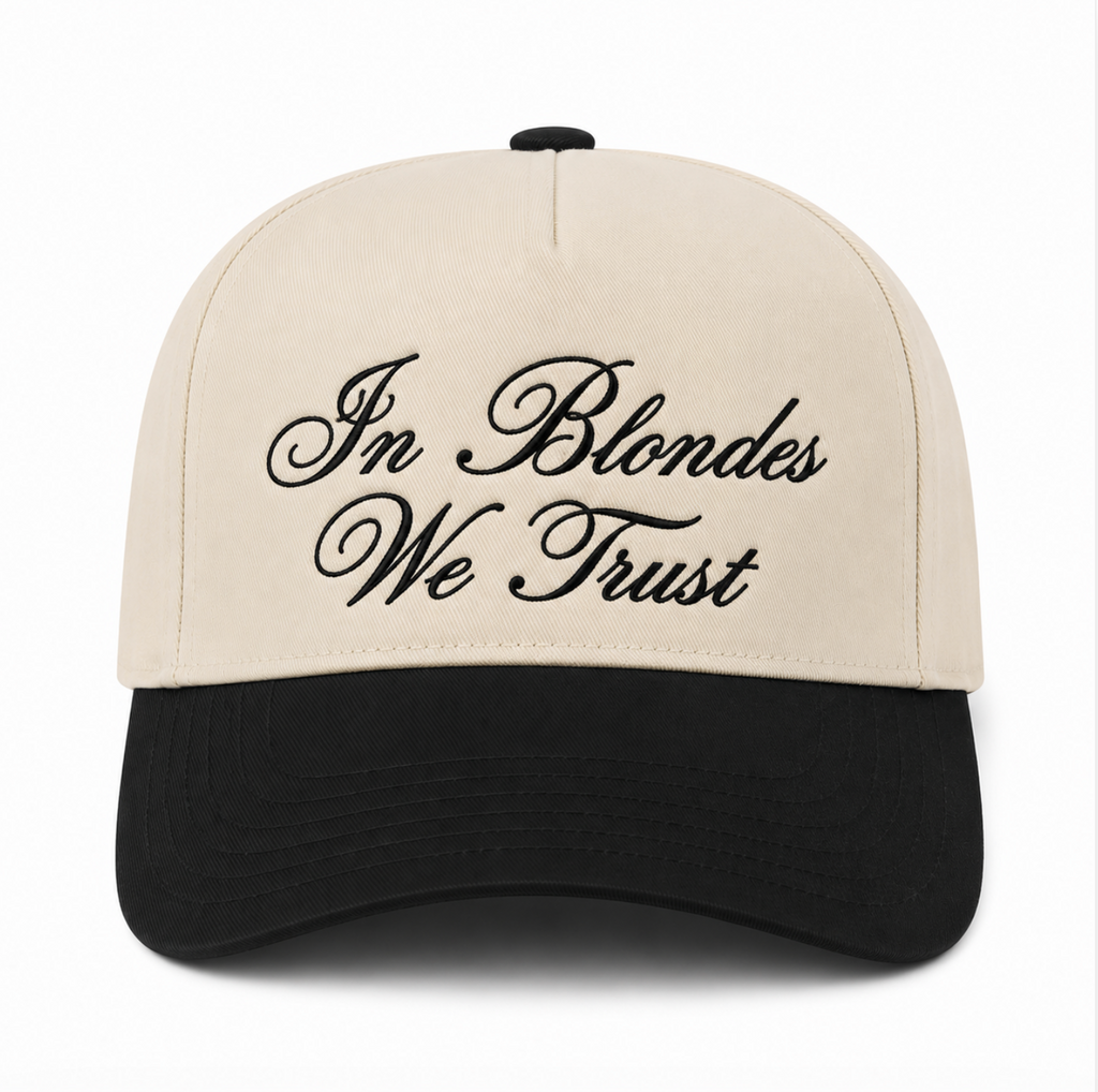Beige and black cap with 'In Blondes We Trust' text on a white background