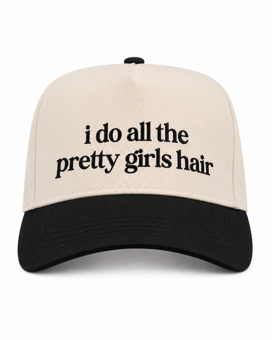 Beige and black cap with 'i do all the pretty girls hair' text on a white background